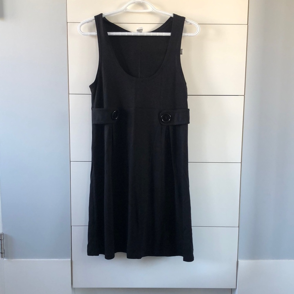 Simple black dress with button accents